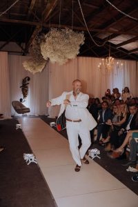 man walking down fashion runway